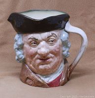 Front view of Royal Doulton Sam Johnson character jug showing detailed facial features and tricorn hat.