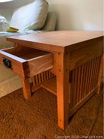 Front and side view of end table with drawer open