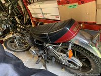 Left side view of the 1978 Yamaha SR500-E showcasing seat cowl, engine, and rear fender