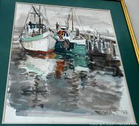 Framed impressionist watercolour of fishing boats at harbor signed Nisbet 72, showing details of boats, dock, and water reflections.