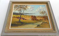 Framed mid-century oil painting depicting autumnal rural scene with trees, farmhouse, barn, and water in the background.