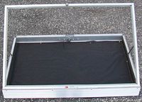 Aluminum framed rectangular display case with black interior lining, showing front view and closed top.