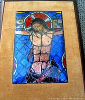 Full view of vintage enameled Jesus Christ on metal artwork framed, showing overall condition and size.