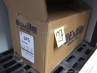 Box labeled Exlfilm Shrink Film brand with product code GPS, dimensions and gauge.