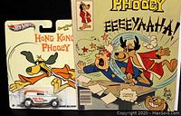 Photo showing Hot Wheels Hong Kong Phooey 1934 Ford Sedan Delivery diecast car in packaging with comic book partially visible behind it.