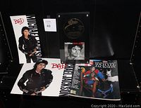 Full view of all items including "Bad" promo poster boards, glass framed disc display, and Life magazine