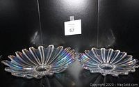 Front view showing the two fluted glass bowls with iridescent rainbow finish, bowl sizes about 11 and 10 inches, placed side by side.