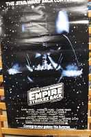 Overall view of the black Star Wars The Empire Strikes Back poster showing the main graphic and film credits.