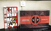 Photo shows the 1993 Deadpool Comic Book #3 next to the sealed Loot Crate Box marked with Deadpool logo and text.