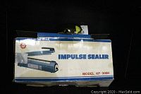 Impulse Sealer in original box showing model KF-300H and packaging for PP/PE bags