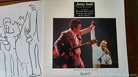 Front cover of Jimmy Smith In Concert vinyl album featuring live performance photo and sketch of musicians.