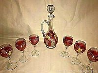 Full set showing 1 decanter and 6 matching glasses