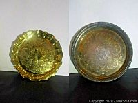 Two silver-plated trays side by side showing engraved surfaces and decorative rims.