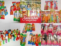 Overview photo showing groupings of loose Pez dispensers and several still in packaging including Snow White and the Seven Dwarfs boxed set.