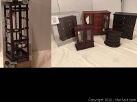 Overview of six decorative jewelry boxes including a tall multi-tiered box and five smaller assorted boxes, two in original packaging.