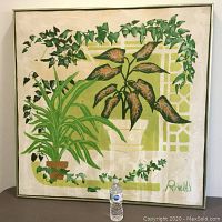 Frontal shot of painting with plastic bottle at base for scale