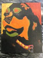 Frontal image of the colorful mixed media artwork featuring a stylized animal, showing texture and color detail.