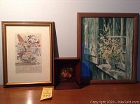 Three framed pieces: original watercolor signed Carolyn Blish, small floral print, larger botanical print.