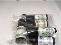 Photo of essential oil bottles in sealed plastic bag showing set contents and labels.