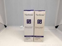 Photo of two Neostrata Moisture Infusion 24-Hr Hydrating Serum boxes side-by-side showing front and side panel details.