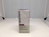 Front view of the Neostrata Correct Intensive Renewal Overnight Anti-Pollution Treatment box showing product name and weight (50g/1.7 oz).