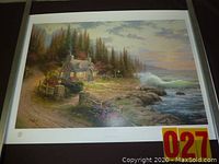 Full view of the Thomas Kinkade lithograph titled Pine Cove Cottage showing cottage by the sea landscape scene.
