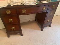 Full front view of solid cherry desk showing knee-hole style, drawer layout and overall condition