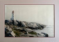 Photo of framed photographic print showing lighthouse on rocky terrain and sea, signed by Peter Li