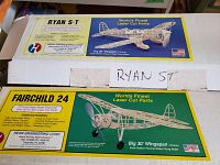 Photo of Herr Engineering Corp model kit boxes for Ryan S-T and Fairchild 24 showing box artwork and branding.