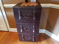 Front view of stacked travel case-style file cabinet
