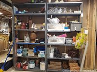 Metal shelving unit with various items including animal figurines, paint cans, boxes, and kitchenware