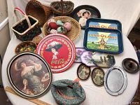 Photo showing full assortment of decorative trays, baskets, cloth eggs, and soft fabric chicken