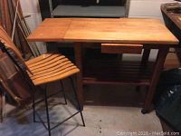Full view of kitchen island cart and matching bar stool