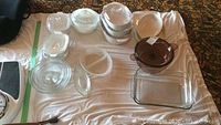 Wide view of all glass and ceramic bakeware including Corningware, Pyrex, Duralex, Vision, and others.