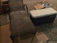 Photo showing Cooler and lounger side-by-side from angled top view.