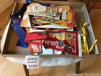 Image showing assorted ephemera including pennants and brochures related to the 1939 Chicago World's Fair and 1936 San Francisco World's Fair in a box.