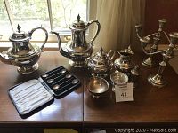 All items in lot displayed on tabletop