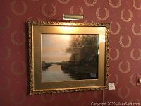 Frontal view of framed oil painting 'Mill in Landscape' by James C. Magee.