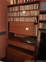 Upper section with CD shelves and display ledge