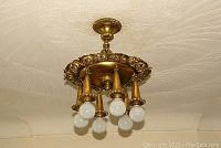 View of fixture installed on ceiling showing all six bulbs