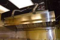 Full front view of vent hood showing underside and duct connections