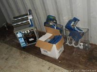 Overall view of base unit, two mixing bowls, spare lids and parts