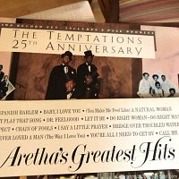 Front cover of The Temptations 25th Anniversary and Aretha's Greatest Hits vinyl records showing group images and song titles.
