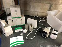 Overview showing three mount boxes, silicone skins, base station and cameras