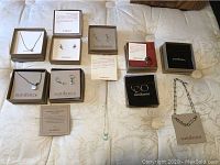 Overview of all jewelry items including necklaces, earrings, rings, and bracelets in their Sundance boxes