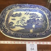 Top view of the rectangular Blue Willow platter showing the full detailed blue pattern design.