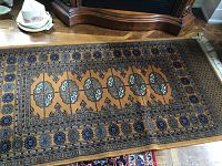 Front view of rectangular area rug showing overall design and colors.