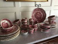 Full layout of all ironstone items on marble surface showing scale and pattern