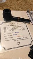 Pipe displayed alongside Alfred Dunhill Classic Series COA certificate