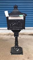 Front view of mailbox and pedestal